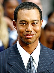 A Hug, Kiss and British Open Win for Tiger