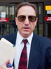Teen Arrested in Slaying of TV Lawyer's Wife