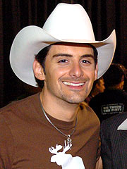 Brad Paisley, George Strait Lead CMA Nominations