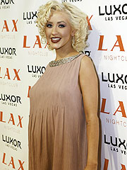 Paris Hilton Makes a Baby Announcement – for Christina Aguilera