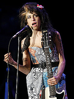Report: Amy Winehouse Lashes Out at Fan