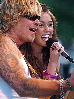 Miley Cyrus Makes Surprise Appearance at Fund-Raiser
