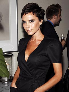 Victoria Beckham Admits to (Gasp!) Smiling