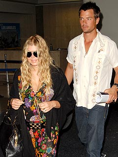 Fergie & Josh Jet Back from the Bahamas