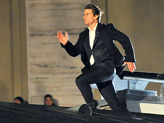 Tom Cruise Races Across Rooftops in Austria