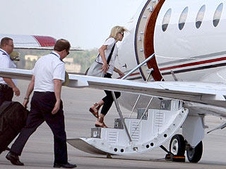 Elin Nordegren Jets Off (Solo) to Visit Her Mom in Hospital