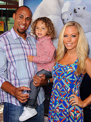 Kendra Wilkinson Helps Her Two Hanks