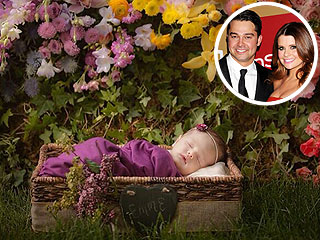 Nick and JoAnna Garcia Swisher Introduce Emerson
