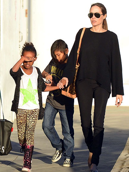 Brad Pitt & Angelina Jolie's Globe-trotting Family