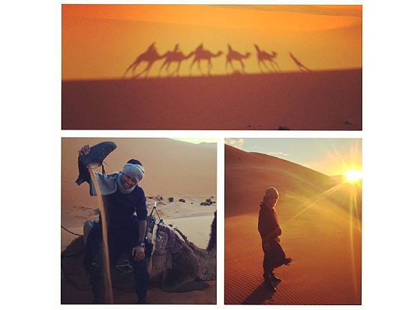 Usher Rides a Camel and Camps in the Sahara Desert