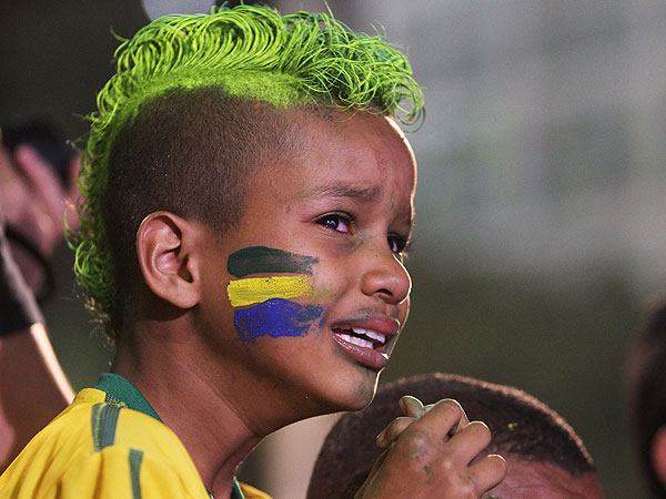 Sad World Cup Fans Highlight Brazil&#39;s Loss to Germany (PHOTOS) - brazil-fans-t-600x450