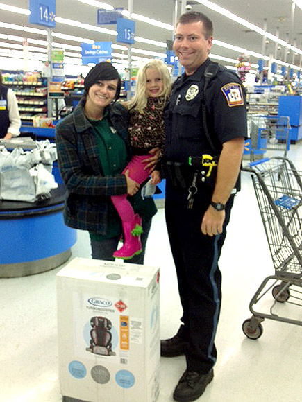 Instead of ticket, Michigan officer buys girl booster seat