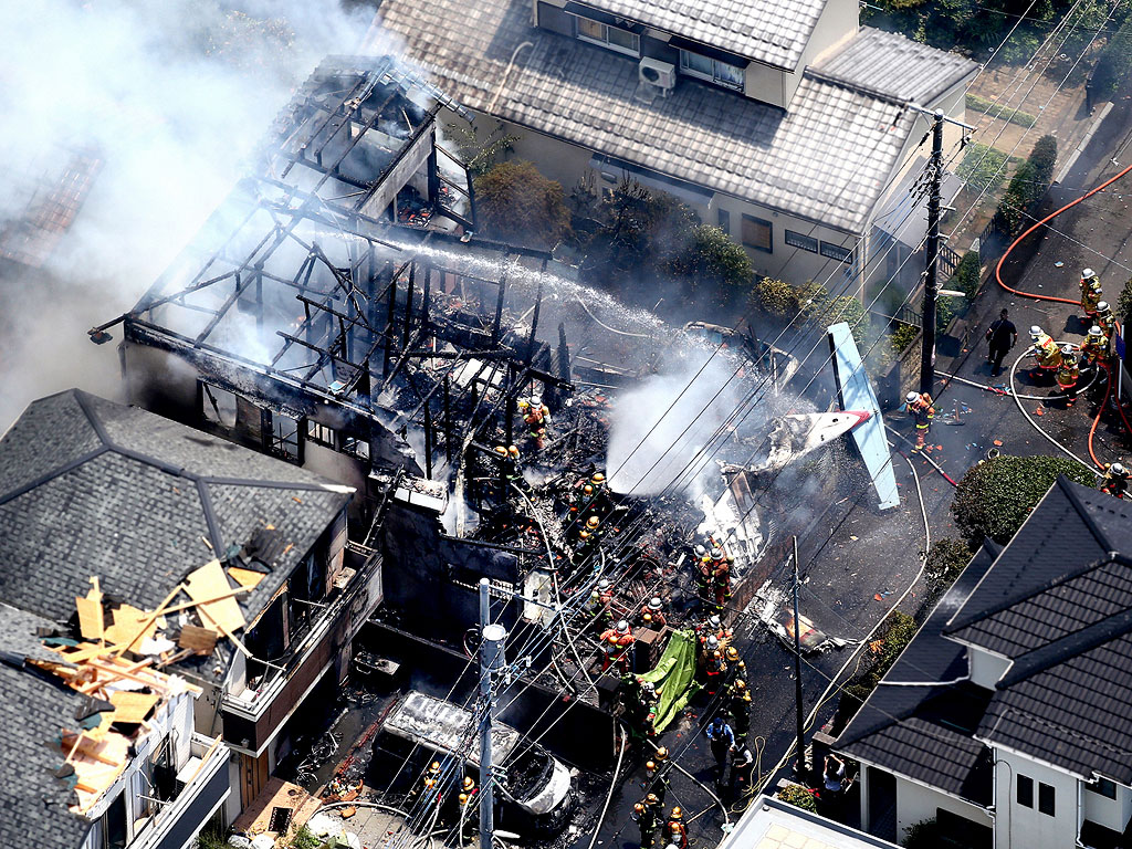 3 Dead, 5 Injured After Tokyo Plane Crash Sets Neighborhood on Fire