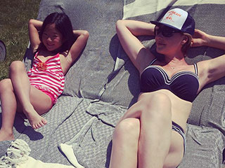 Pregnant Katherine Heigl Lounges Outside in Navy Blue Bikini with Daughter Naleigh