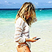 Bikini-Clad Chloë Grace Moretz Does Her Best Baywatch Slo-Mo During Dominican Republic Vacation
