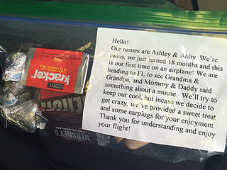 Parents Hands Out 'Twin Survival Kit' to Fellow Flyers: 'We've Provided a Sweet Treat and Some Earplugs for Your Enjoyment'