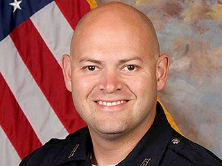 Tennessee Cop, a Father of Three, Killed by Gunshot that Just Missed His Bulletproof Vest