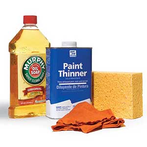 woodwork cleaners: Murphy Oil Soap, paint thinner, rag, sponge