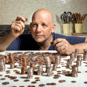 TOH Editor Scott Omelianuk counting coins