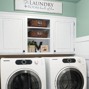 budget laundry room redo with painted cabinets and walls