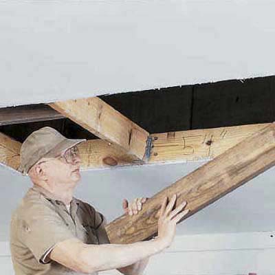Removing joists and other obstructions from the attic opening