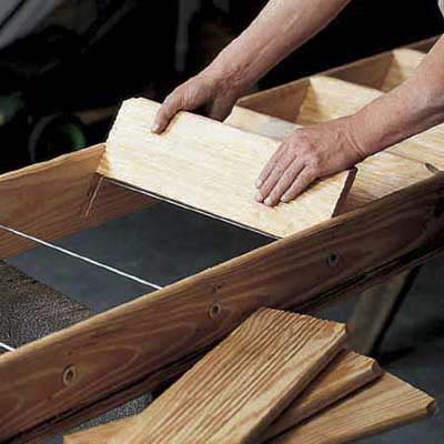 Assemble the staircase by installing treads