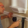 adding a decorative chair rail beneath the niche adds to the look