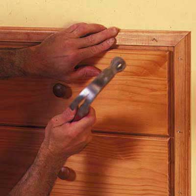 finish the knee-wall storage installation with attractive wood trim to match dresser
