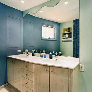Watery hues for paint and tile and wavy mirror.
