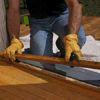Prepare the sill by removing the adjustable wood strip from the original threshold