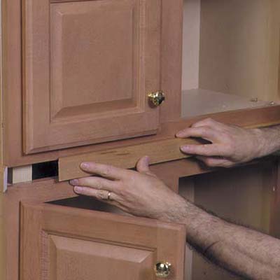 conceal the gaps between cabinets with molding