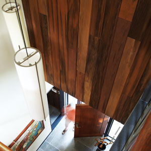 Olive-curing barrels repurposed as wood paneling