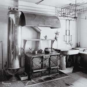 old style Manhattan kitchen with oversized hood