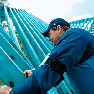 Man applying BluWood