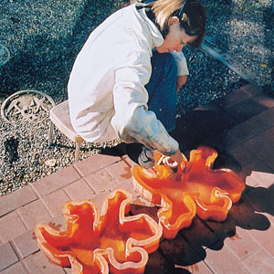 reader with gecko paver molds