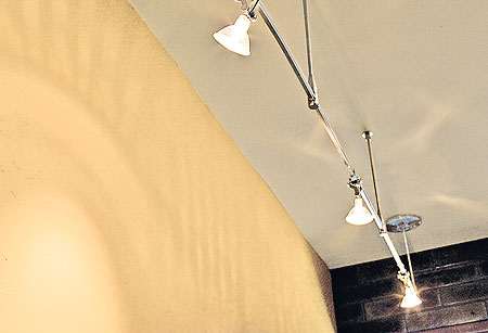 beige paint and track lighting