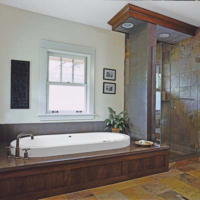 master bathroom has Neptune soaking tub and shower with multicolor slate tile 