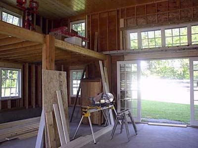 The interior of the old horse barn during its transformation.
