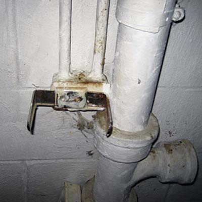 toilet tissue holder is mounted onto an electrical box