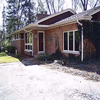 worn-down asphalt driveway