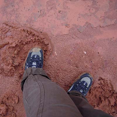 Muddy shoes at work site