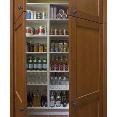 Pantry with custom shelves in Arts and Crafts kitchen
