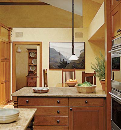 Arts and Crafts kitchen with doubled pantry storage, customized cabinetry, reduced vent, and 