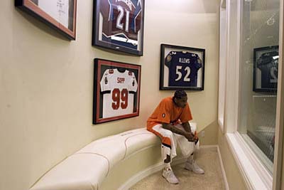 NBA star Carmelo Anthony overlooking his indoor batting cage