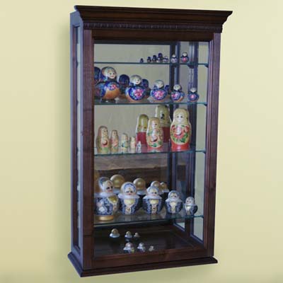 display case, wood-framed glass case, Russian dolls