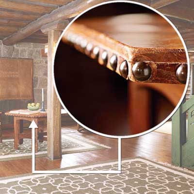 Upholstered Craftsman tables with oversized tacks