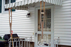crutches holding up an entry awning