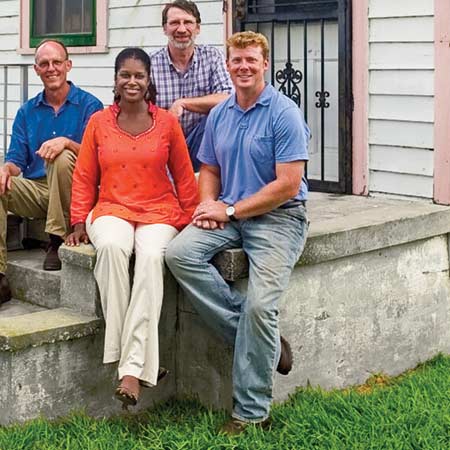 group shot of kevin, norm, and new orleans project home owner