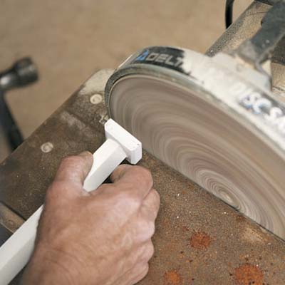 porch posts get some finishing touches on a bench sander