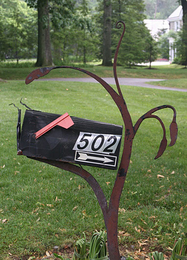 Sculpture mailbox post